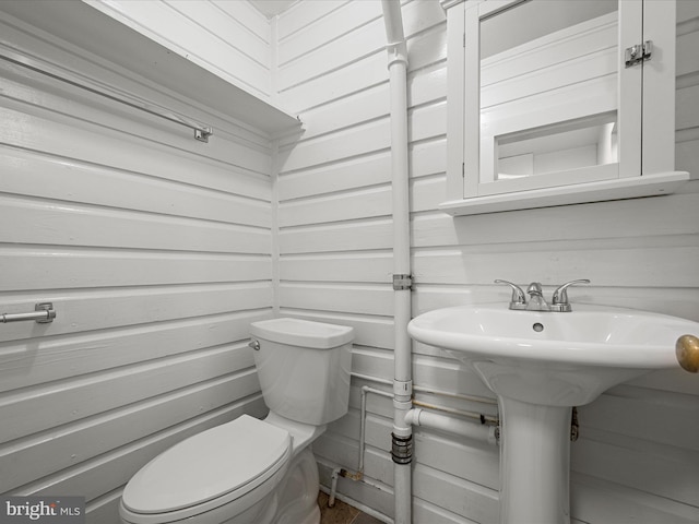 bathroom with sink and toilet