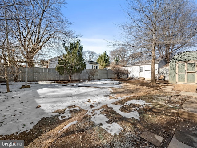 view of yard covered in snow