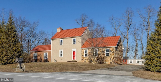 view of front of house with a front yard