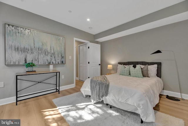 bedroom with light wood-type flooring