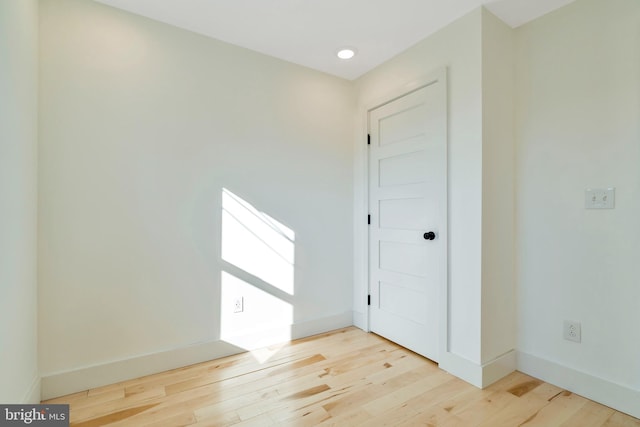 unfurnished room featuring light wood-type flooring