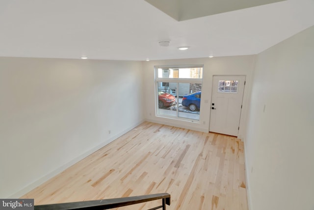 entrance foyer with light hardwood / wood-style flooring