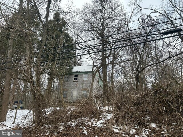 view of snow covered property