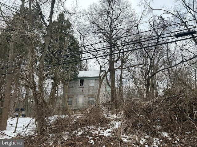 view of snow covered property