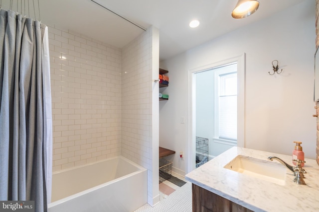 bathroom featuring vanity, shower / bath combination with curtain, and tile patterned floors