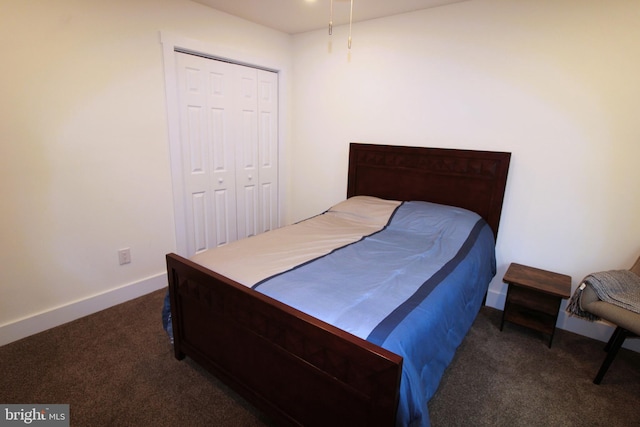 carpeted bedroom featuring a closet