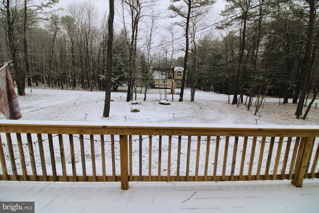 view of snow covered deck