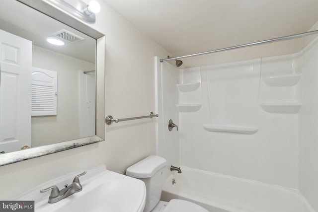 full bathroom with  shower combination, toilet, and sink