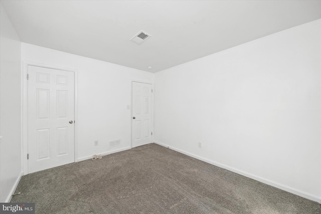 spare room with carpet