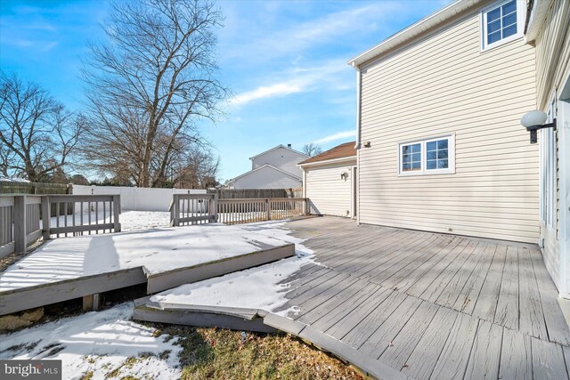 view of snow covered deck