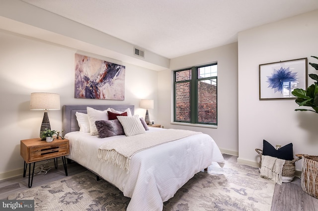 bedroom featuring hardwood / wood-style flooring