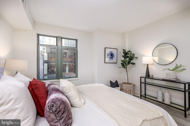 bedroom featuring hardwood / wood-style floors