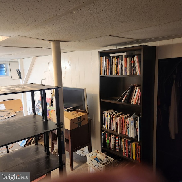 interior space featuring a paneled ceiling