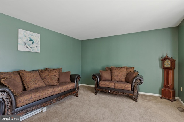 living room featuring light carpet