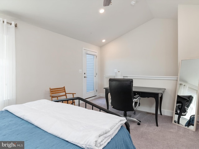 bedroom featuring vaulted ceiling and light carpet