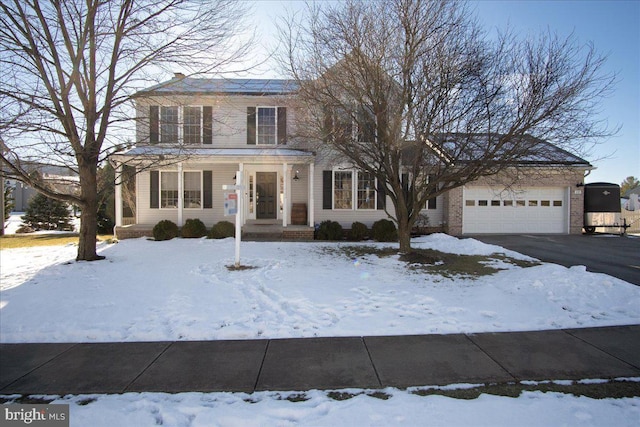 front facade with a garage