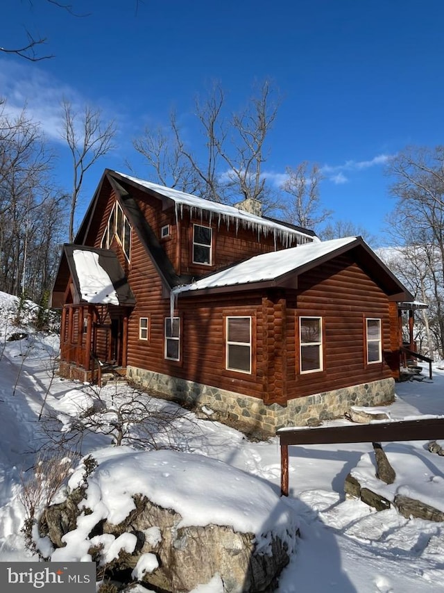 view of snow covered property