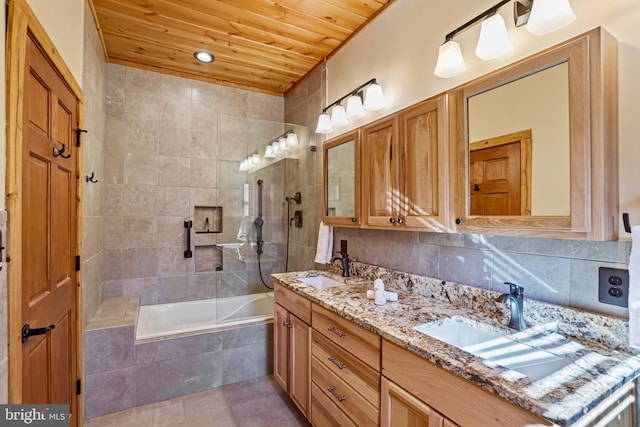 bathroom featuring wood ceiling, vanity, tile patterned flooring, and decorative backsplash