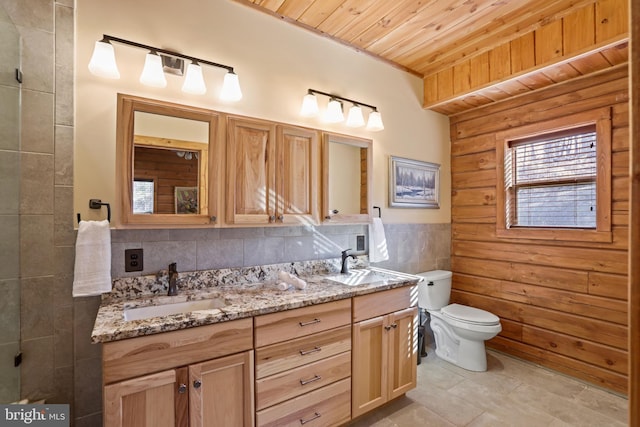 bathroom featuring tasteful backsplash, tile walls, vanity, wood ceiling, and toilet