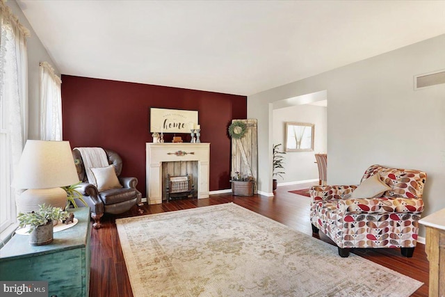 living area featuring dark hardwood / wood-style floors