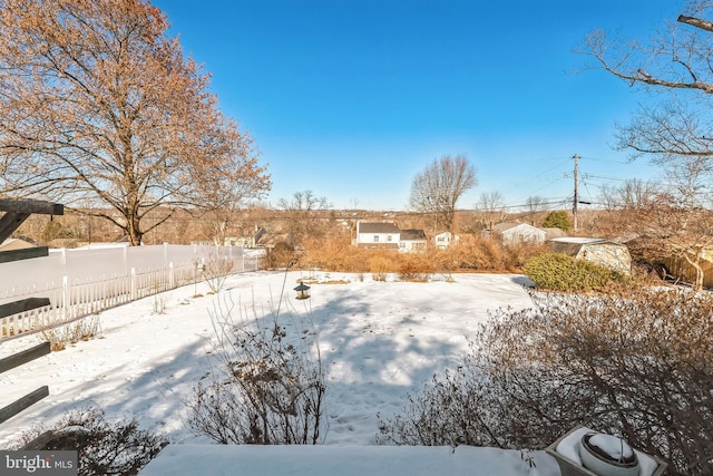 view of snowy yard