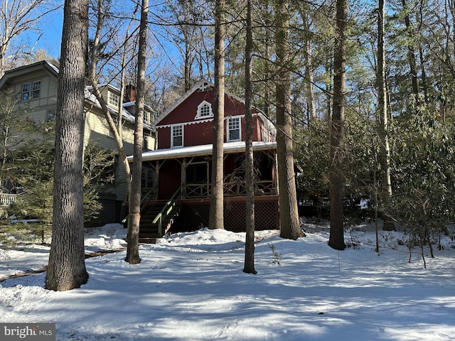 view of snow covered property