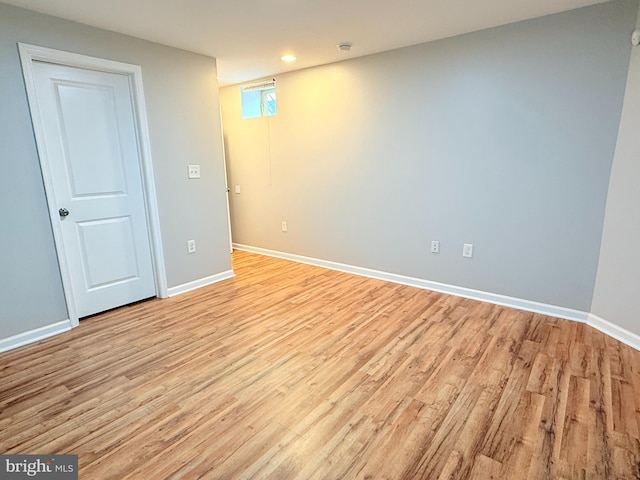 spare room featuring light hardwood / wood-style floors