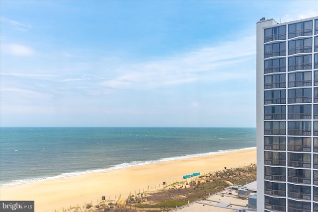 view of water feature with a beach view