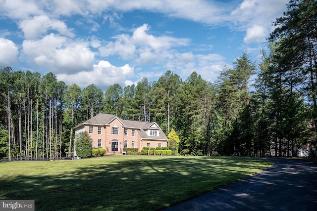 view of front of house with a front lawn