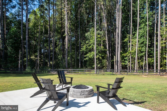 view of patio featuring an outdoor fire pit