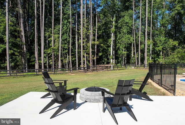 view of patio / terrace with a fire pit