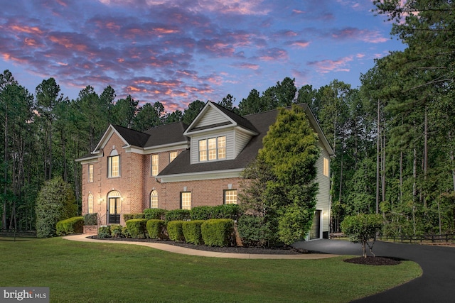 view of front of house with a lawn