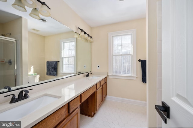 bathroom featuring vanity, tile patterned floors, and walk in shower