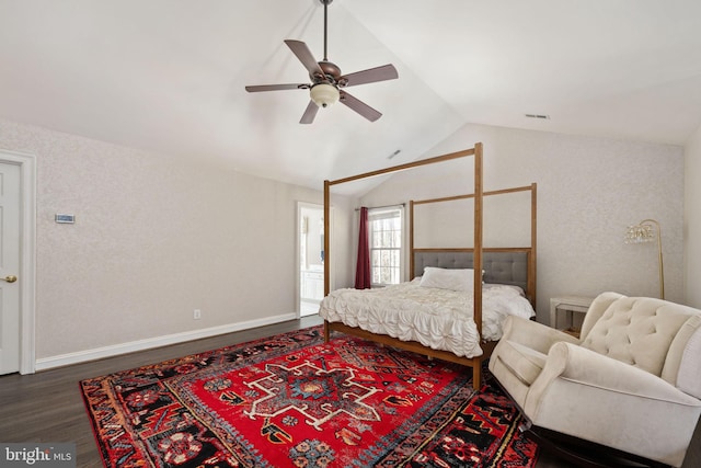 bedroom featuring lofted ceiling, dark wood-type flooring, and ceiling fan