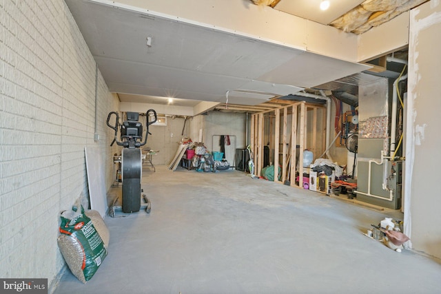 unfinished basement with brick wall