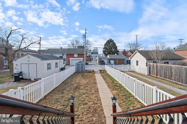 exterior space featuring street lights, sidewalks, and a residential view