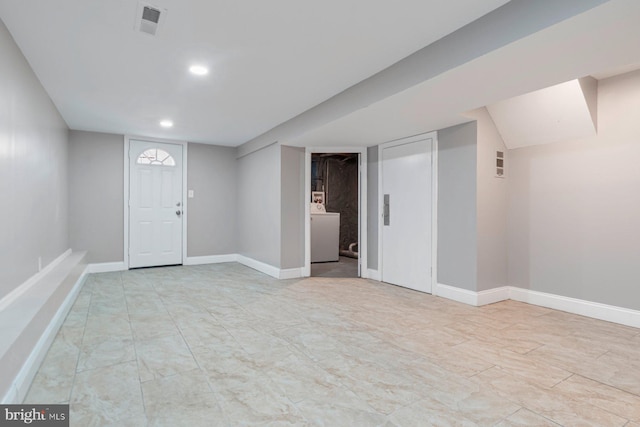 basement with washer / clothes dryer