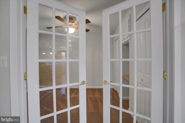 interior details featuring ceiling fan and french doors