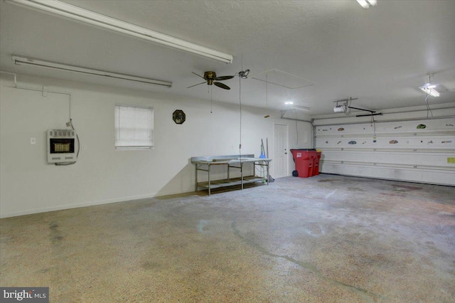 garage with heating unit and a garage door opener