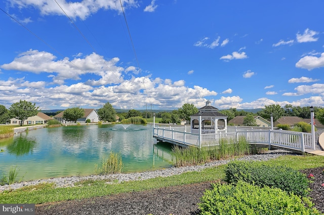 dock area featuring a gazebo and a water view