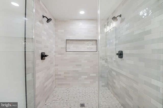 bathroom featuring an enclosed shower