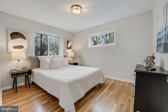 bedroom featuring wood-type flooring