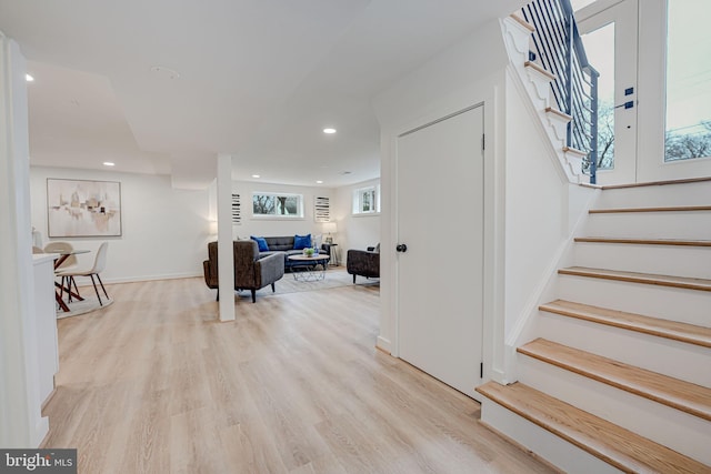 staircase featuring hardwood / wood-style flooring