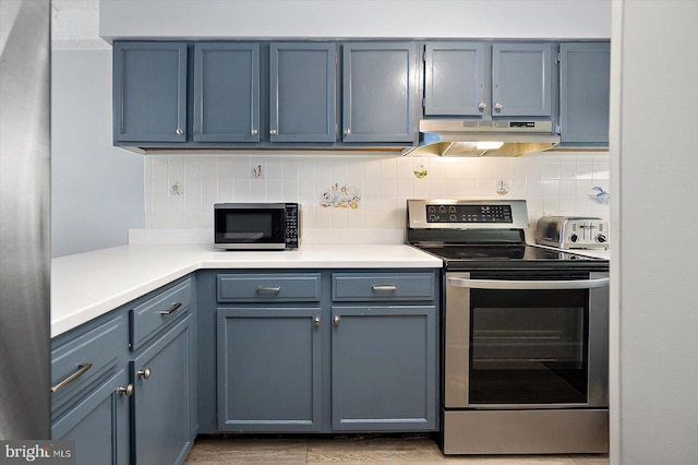 kitchen featuring tasteful backsplash, blue cabinetry, and stainless steel range with electric stovetop