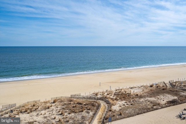 view of water feature with a beach view