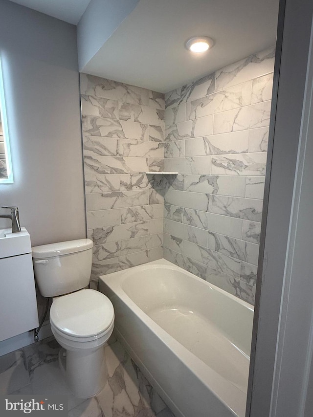 bathroom with shower / tub combination and toilet