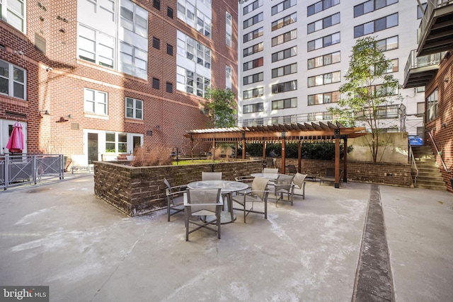 view of patio featuring a pergola