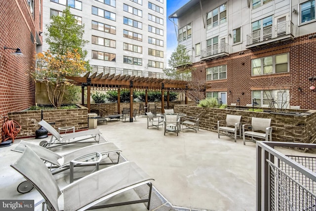 view of patio / terrace featuring a pergola