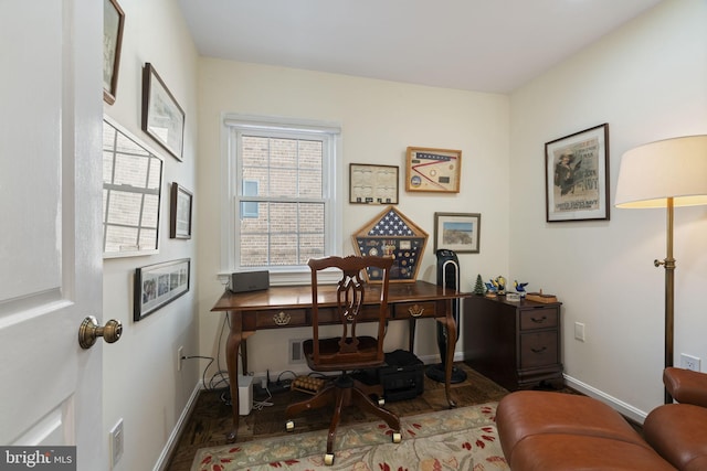 office space with dark hardwood / wood-style floors