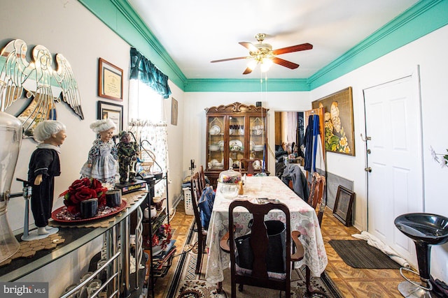 dining room with parquet floors and ceiling fan